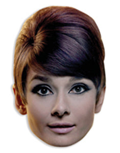 A cardboard face mask with an image of Audrey Hepburn printed on it.