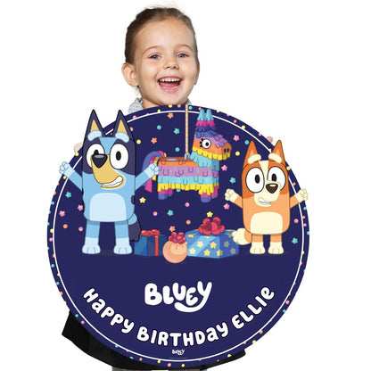Child wearing a 'Bluey' birthday party hat with cartoon characters and 'Happy Birthday Ellie' text.